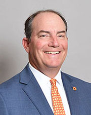 Decorative. A portrait of J. Clifford Foster IV.