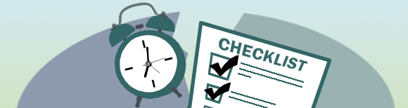 An alarm clock and a checklist in front of a sphere with a large crack running through it