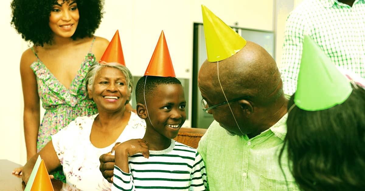 Decorative. A multigenerational family celebrating a birthday.