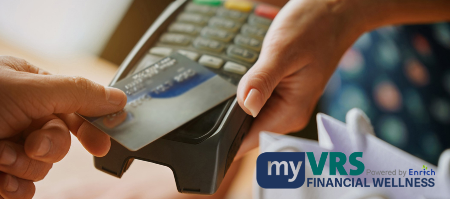 A person holding a credit card